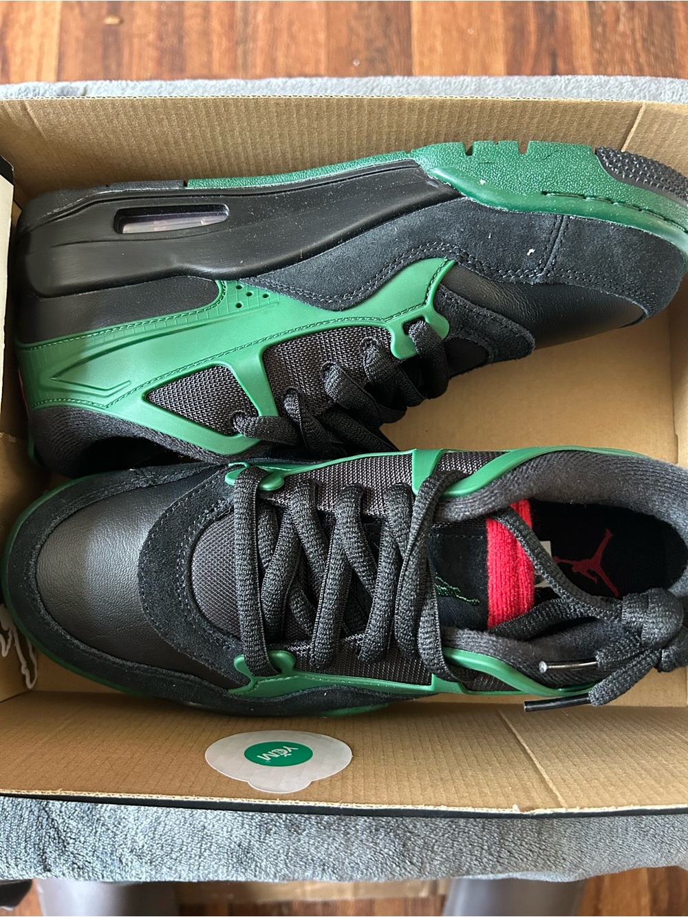 Jordan Low-Top Sneakers in Black and Green with Red Tongue Accent